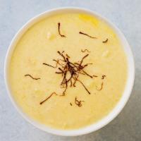 House Special Rice Pudding · Rice, cream, milk, sugar, fragrant spices, and saffron. Served chilled.