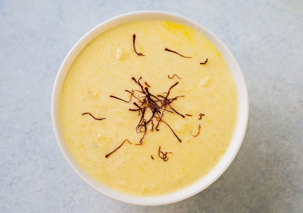House Special Rice Pudding · Rice, cream, milk, sugar, fragrant spices, and saffron. Served chilled.