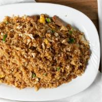 Arroz Chaufa De Pollo · Chicken fried rice.