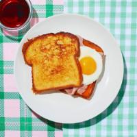Le Ham, Egg, And Cheese French Toast Sandwich · You’ll be doing the “can can” like a dancer at the Moulin Rouge after enjoying this. Ham, fr...