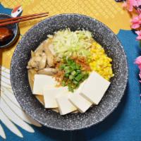 Vegetarian Miso Ramen · vegetable broth, miso base, seasoned tofu,  corn, cabbage, mushroom,  crispy fried onion, gr...