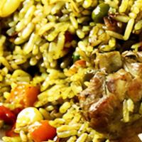 Arroz Con Pollo · Rice Cooked in a Cilantro Sauce with 1/4 Rotisserie Chicken And Salad.