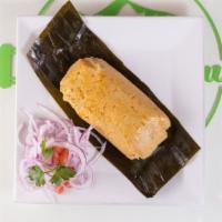 Tamal Peruano · Stuffed Corn meal, Chicken or Pork.