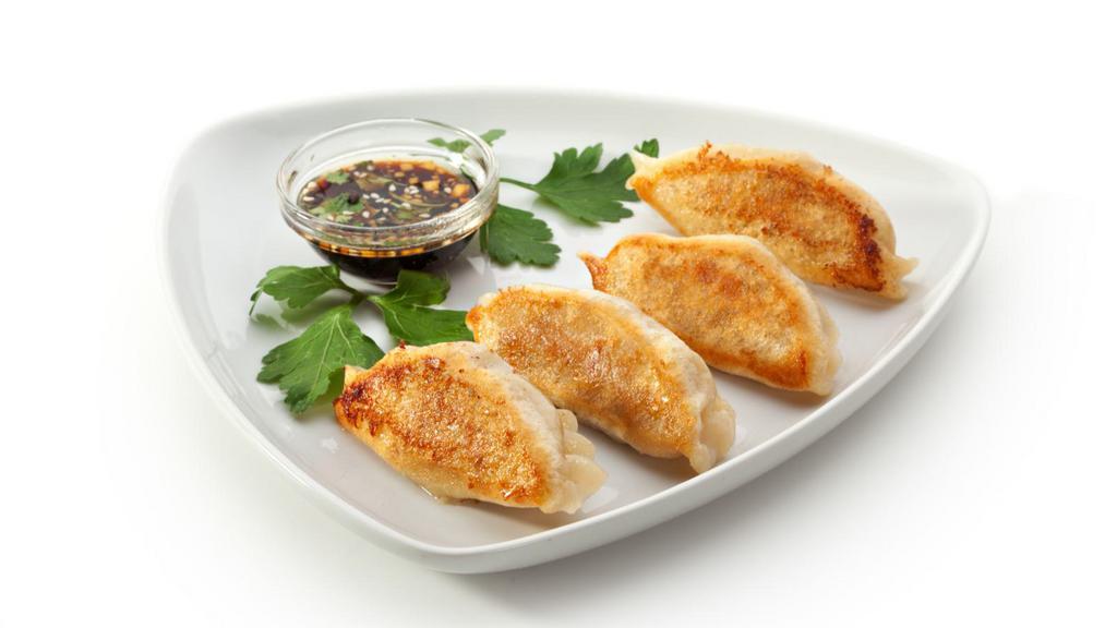 Vegetable Dumplings · Six pieces of customer's choice of steamed or fried vegetable dumplings.