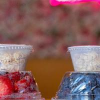 Yogurt Parfait · Low fat vanilla yogurt topped with fruit & granola