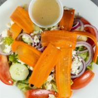 Greek Salad · Tomato, onion, cucumber, carrots, olives and feta cheese.