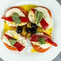 Fresh Mozzarella With Tomato Salad · Mozarella, tomato, roasted red peppers, and olives.