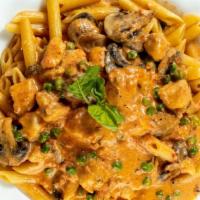 Penne Alla Antonio · Mushrooms and peas sautéed with a touch of pink sauce.