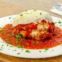 Meat Lasagna · Ricotta, meat sauce and mozzarella.