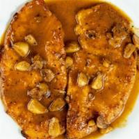 Chicken Oreganata Dinner · Breadcrumbs and served in a light garlic wine sauce.