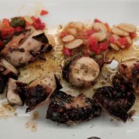 Octopus · Grilled and served with extra virgin olive oil and a touch of balsamic.