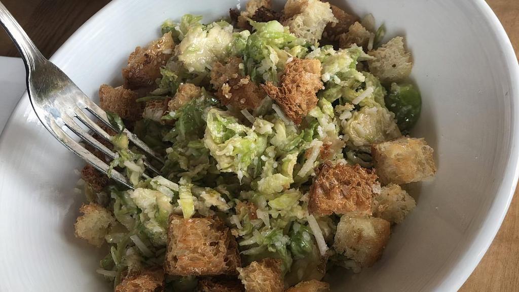 Kale Caesar · Vegetarian, gluten-free option, nut-free. Parmesan dressing, croutons.