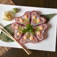 Passion Roll · Spicy crunch tuna, crab meat, avocado insider wrapped with tuna in heart shape and spicy mayo.