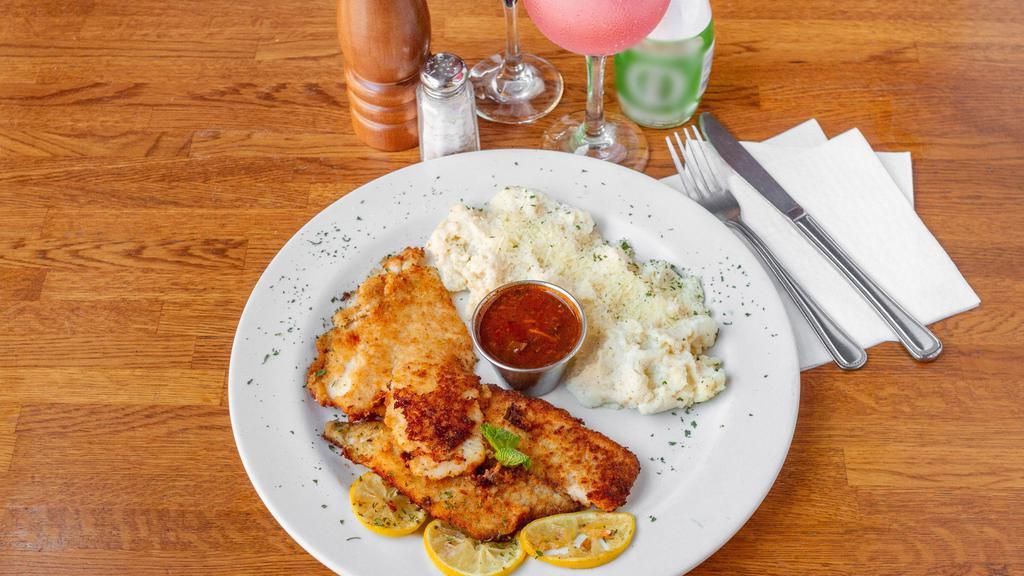 Flounder With Creole Sauce And Mashed Potato · Pan-browned bread crumb with creole tomato sauce, capers, and black olive.