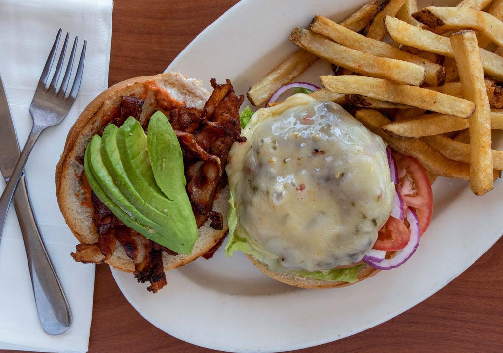 Burger Blt · Burger pepper jack cheese, romaine, tomato, avocado, onions, bacon and chipotle mayo.