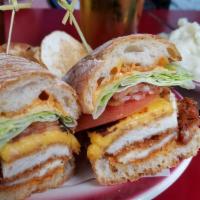 Dirty Bird  · fried chicken, bacon, cheddar, fried onions, lettuce, tomato, chipotle aioli