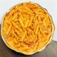 Penne Alla Vodka · Alta cucina tomato sauce with basil and a touch of cream.