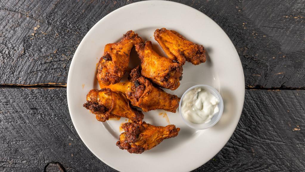 Wings · (6) wings tossed in choice of sauce (buffalo, garlic parmesan, BBQ, teriyaki, lemon pepper or naked)
Dipping sauce (Blue cheese, ranch, honey mustard)