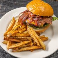 Meaty Burger · Applewood bacon, lettuce, onion , tomato, ketchup and mayo. Served with sliced pickle