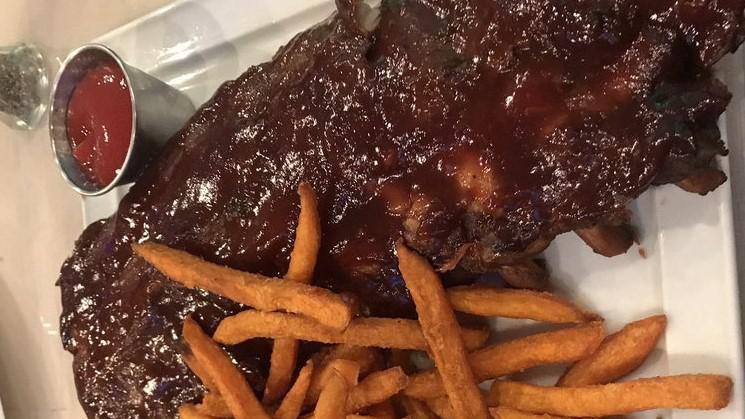 Bbq Ribs · Full Rack of BBQ Baby Back Ribs. Served with Sweet Potato Fries & Coleslaw.