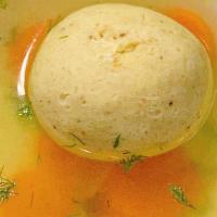 Matzoh Ball Soup · Matzoh Ball Soup with Jewish Penicillin (Baz Liquid Gold Chicken Broth), Carrot and Dill.16oz