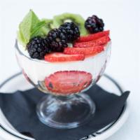 Greek Yogurt Parfait · Summer Berries, Greek Yogurt, Organic Granola.