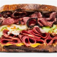 Lenwich · Hot pastrami, corned beef, melted Swiss, coleslaw and Russian dressing.