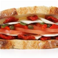 Caprese Sandwich · Fresh mozzarella cheese, roasted red peppers, tomato, basil, capers and sundried tomato pesto.