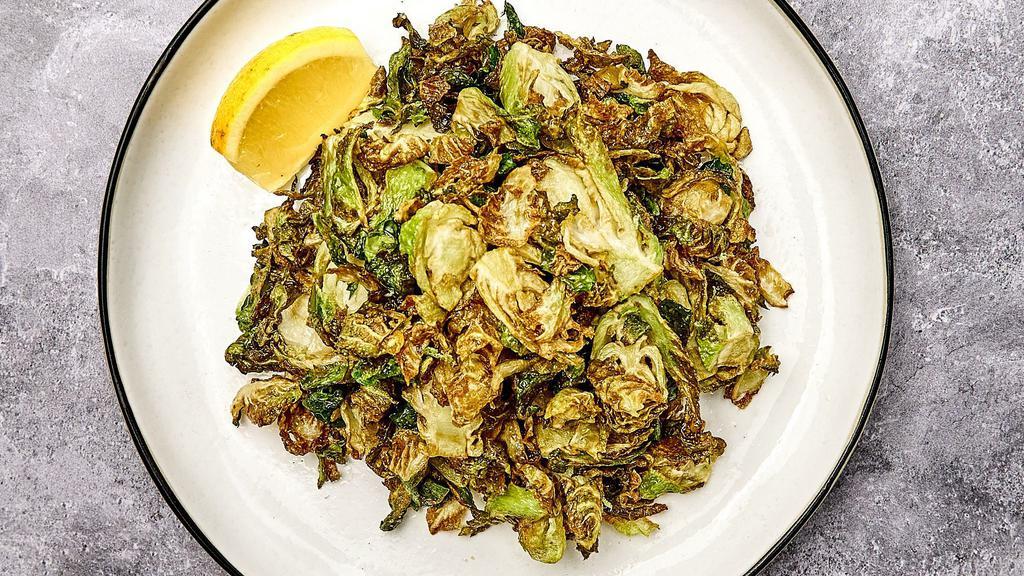 Crispy Brussels Sprouts · Crispy fried brussels sprouts with lemon and salt.