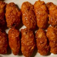 Orignal Buffalo Wings · 10 pc of Bell ＆ Evans homemade Buffalo style wings. Served with carrots, celery, and your ch...