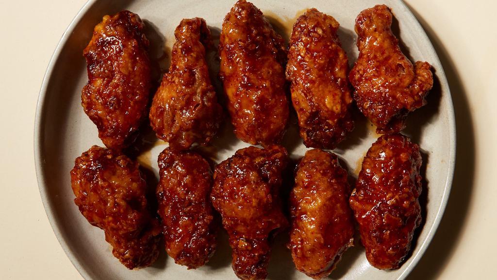 Garlic Chili Wings  · 10 pc of Bell ＆ Evans wings in Korean style chili garlic sauce that is sweet and savory. Served with carrots, celery, and your choice of dipping sauce