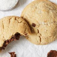 Nutella Sea Salt · Classic chocolate chip cookie with a soft Nutella filling, topped with flaky sea salt, dark ...