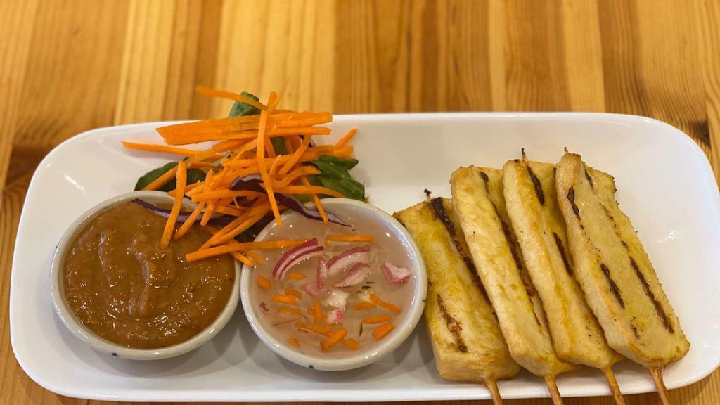 Chicken Satay · Marinated chicken grilled on skewers and served with a peanut sauce.