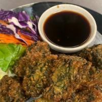 Vegetable Dumpling [Chive Cake] · Pan fried chive cake with special sweet sauce.