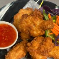 Chicken Wings · Deep fried chicken wings with sweet chili sauce