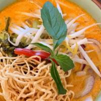 Khao Soi · Northern style curry with chicken (mini drumsticks), bean sprouts, pickle, red onion, dried ...