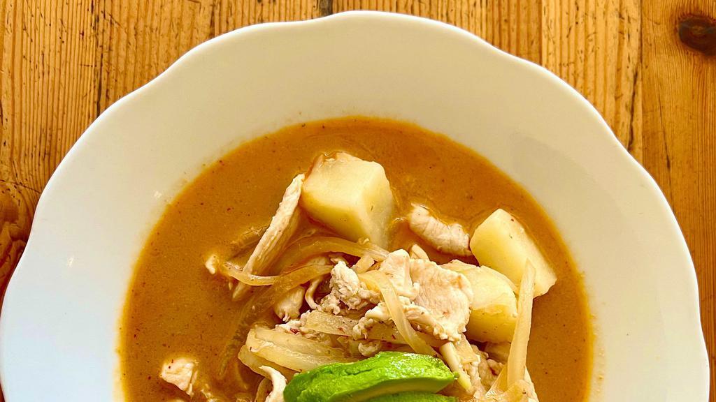 Gaeng Massaman Curry · Indian inspired spices blended in chili paste with onion, potato, and peanut simmered in coconut milk.