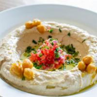 Hummus Platter · Popular. With warm chickpeas, tomato, onion, extra virgin olive oil, and parsley.