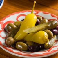 Olives & Pickles · marinated olive medley, pickled cucumbers, & pickled hot peppers