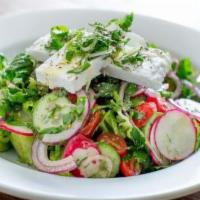 Greek Salad · Feta cheese, romaine, cucumber, tomato, red onion, fresh herbs, za'atar croutons, extra virg...