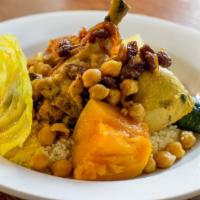 Chicken Couscous · slow cooked chicken, braised butternut squash, carrots, zucchini, celery, turnips, served ov...