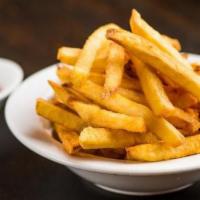 French Fries · with Harissa ketchup.