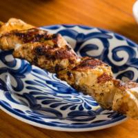 Extra Chicken Skewer · Marinated & grilled in our house-made spice blend