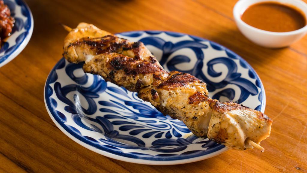 Extra Chicken Skewer · Marinated & grilled in our house-made spice blend
