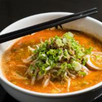 Tan Tan Ramen · Wavy noodle, spicy sesame broth topped with spicy ground pork, tamago, scallion, bean sprouts.
