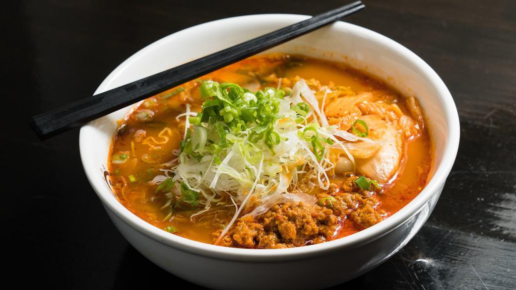 Kimchi Ramen · Wavy noodle, spicy soy sauce based, topped with kimchi, tamago, scallion, cabbage.
