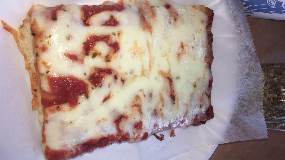 Sicilian Cheese Pizza Slice · With mozzarella cheese and special marinara sauce on a thin crust.