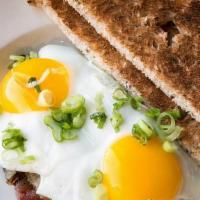 Pastrami Hash · Sunny-side eggs, while wheat toast.