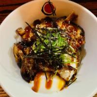 Chashu Don · Pork Over Rice w/ Poached Egg, Scallion, Nori flakes & Chef Special Sauce.