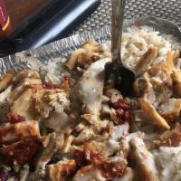 Chicken Shawarma · We use our house made spice blend marinate chicken and made into a shawarma slow roasted and...
